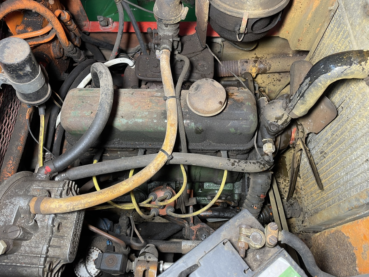 Motor accu/bestuurder/oliepeilstok/bougies kant